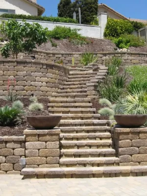 Retaining WallsSee our retaining walls and feel a sense of pride. Beyond their strength, they add an aesthetic charm to your landscape, blending form and function beautifully.